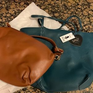 Purse and tote in teal and brown, two bags in one. Brand new with dust cover.
